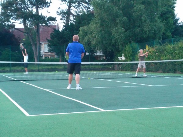 League tennis match in progress